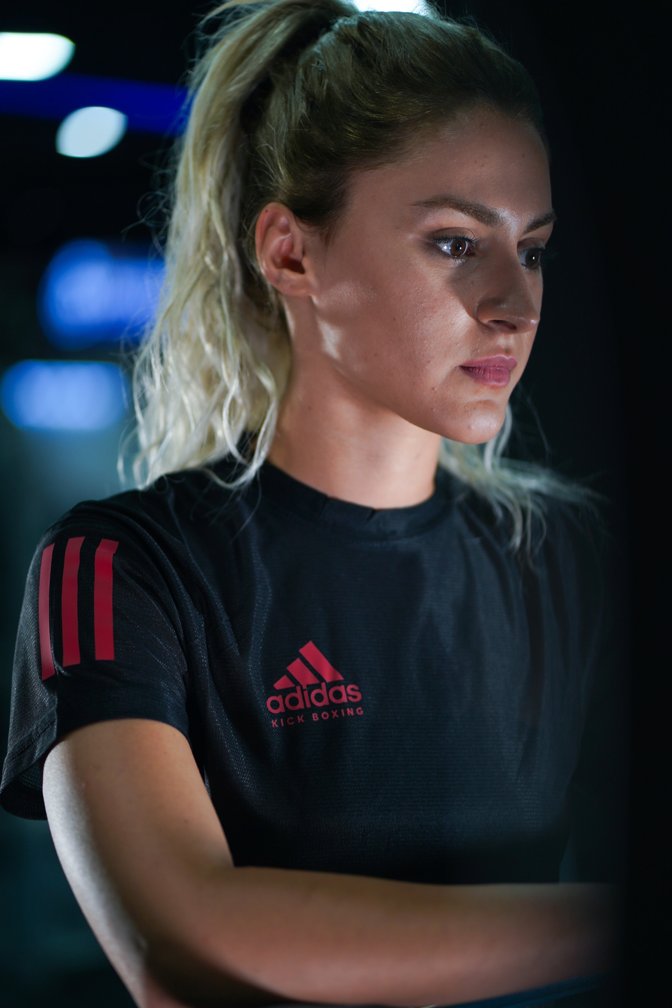close-up-side-angle-blonde-girl-adidas-kickboxing-tshirt-red-logo
